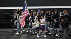 The United States athletes parade during the Opening Ceremony for the 2024 Paralympics, Wednesday, Aug. 28, 2024, in Paris, France.