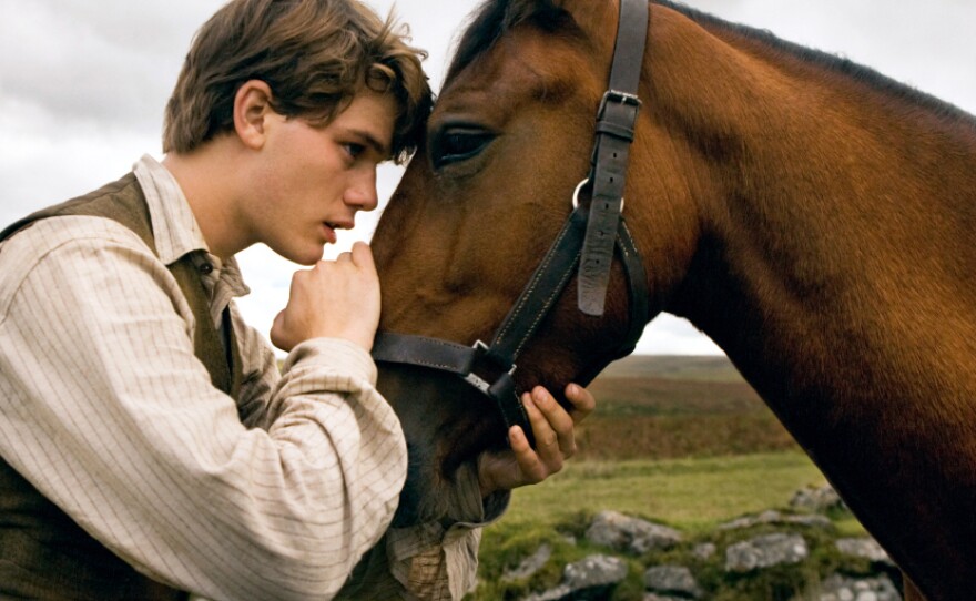 Director Steven Spielberg delivers <a href="http://www.npr.org/templates/story/story.php?storyId=143513144&live=1">War Horse</a>, an unforgettable odyssey for Albert (Jeremy Irvine) and his horse Joey.