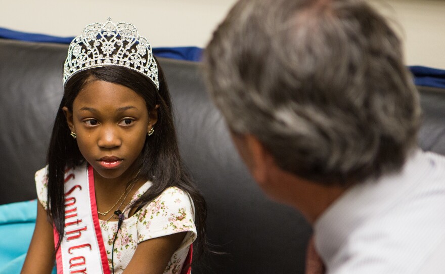 Tymia becomes emotional while telling Sanford about living with sickle-cell anemia, a genetic condition that leads to rigid and malformed red blood cells that don't carry oxygen well and can suddenly block blood flow.