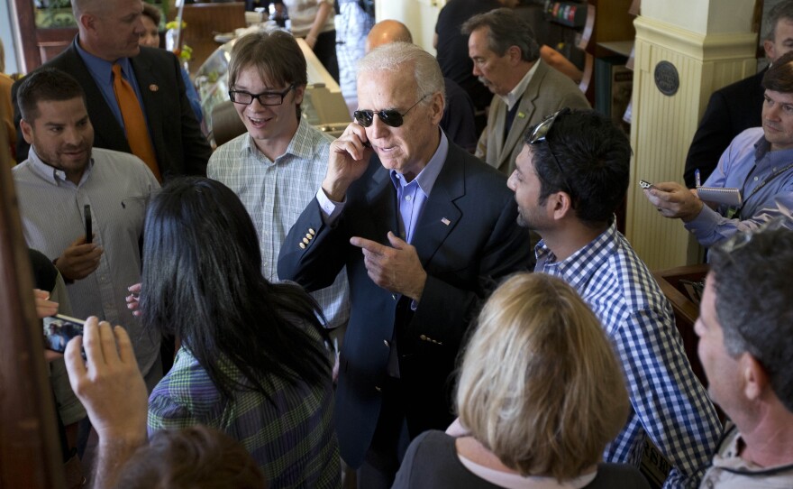 Vice President Biden speaks on a cell phone during a campaign stop in Sarasota, Fla., on Oct. 31, 2012.