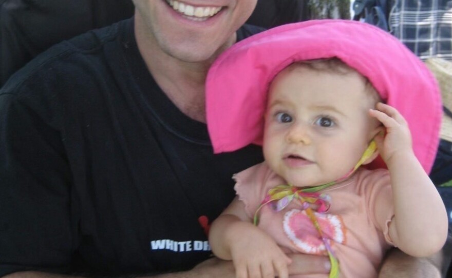 Jeremy Richman celebrates his first Father's Day with his daughter Avielle in 2007. Avielle was killed in the Sandy Hook Elementary school shooting in 2012. Richman died by suicide in 2019, overcome by grief.