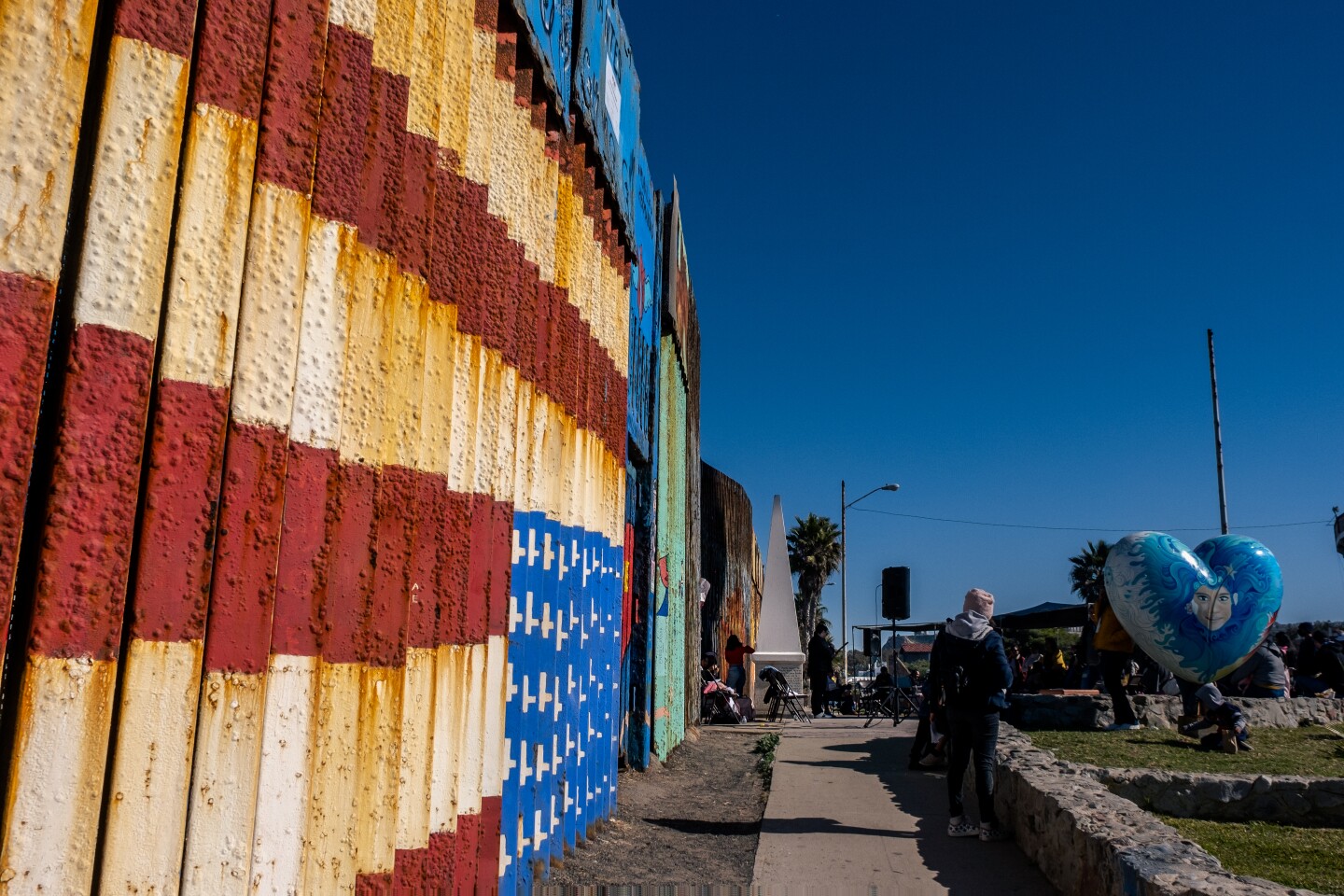 Migrant activists celebrate Christmas in binational Friendship Park as possible closure looms.