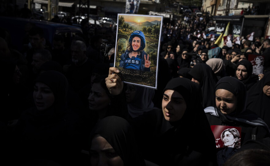 Mourners attend a funeral in Baisariyah, Lebanon, on April 23, 2026, for Amal Khalil, a journalist who was killed in an Israeli attack.