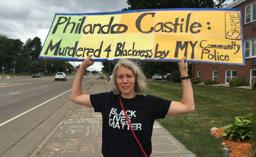 Anna Gambucci, protesting at the site of the shooting of Philando Castile.