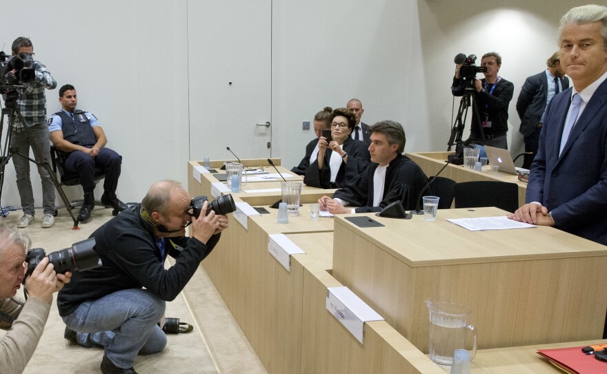 Wilders (right) prepares to address judges at a high-security court during his November hate-speech trial in Amsterdam. He lost the case but faced no legal punishment.
