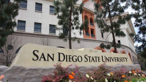 Sign in front of San Diego State University building that reads "San Diego State University."