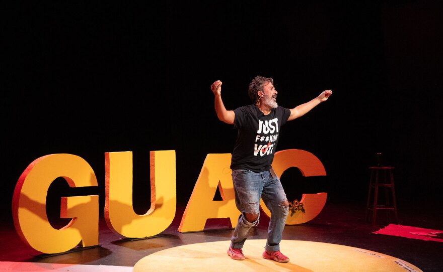 Manuel Oliver is shown on stage in an undated production of his one-person play, "Guac."