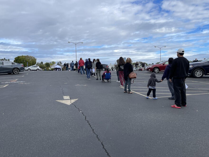 A line at a new COVID-19 testing site at Zion Market on Clairemont Mesa Boulevard in San Diego, Calif. Jan. 17, 2022.