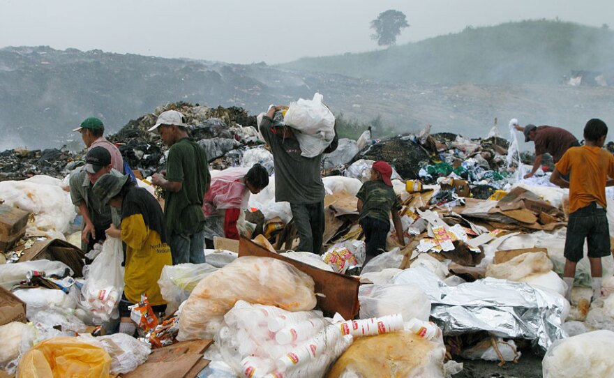 Children as young as 7 are among the scavengers at the dump on the outskirts of Honduras' second-largest city, San Pedro Sula. Living conditions in Honduras, already one of the poorest countries in the hemisphere, have worsened since a coup in June removed Honduran President Manuel Zelaya.