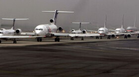 Airplanes line up as they await their turn to take off at Newark International Airport in New Jersey, February, 2008.