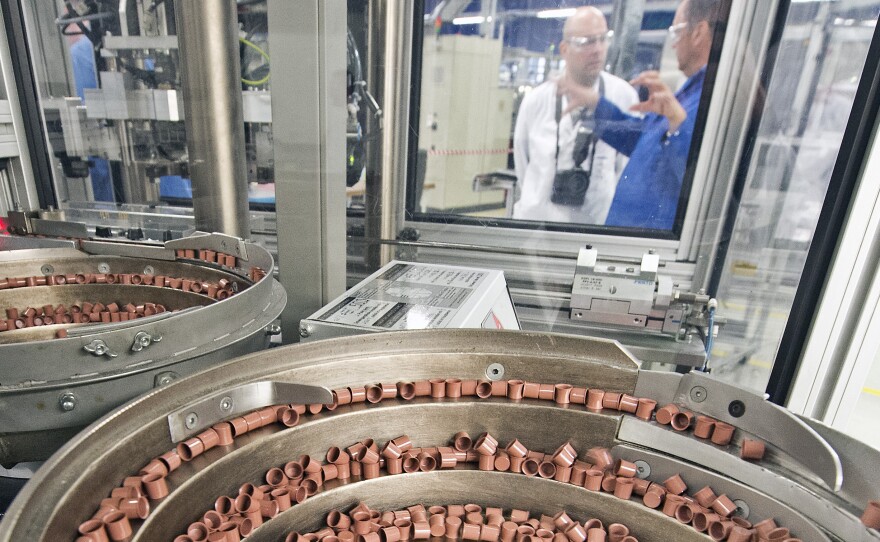 Parts of pyro-electric airbag initiators lie in a production line at the international automotive supplier Takata Ignition Systems GmbH in Schoenebeck, Germany, Thursday, April 17.