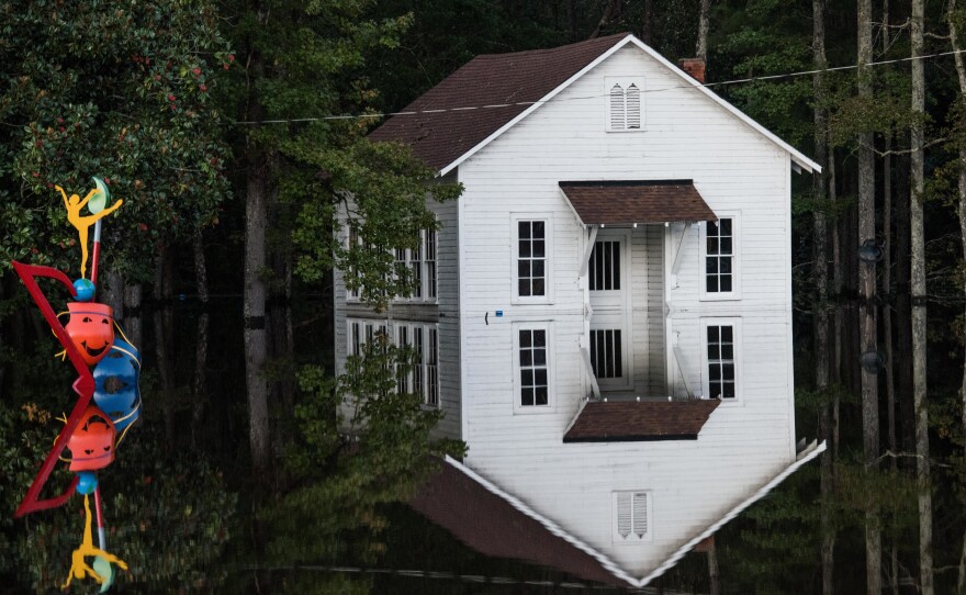 A building is inundated with floodwaters in Lumberton on Monday. Record floodwaters were rising in some areas of North Carolina.