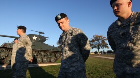 U.S. Army Major Stephen Beckwith (2nd-R) and Captain Reis Ritz (R) arrive to speak with the media about helping with the casualties after U.S. Army Major Nidal Malik Hasan went on a shooting rampage at Fort Hood on November 6, 2009 in Killeen, Texas.