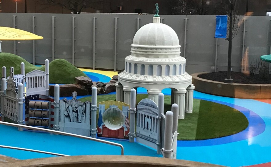 The playground of the new day care facility for staff and lawmakers in the House of Representatives evokes the skyline and the many monuments of official Washington.
