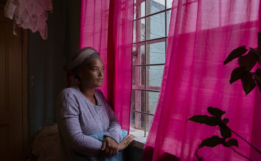 Nalle looking out her kitchen window. 2020.