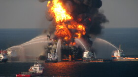 Fire boat response crews battle the blazing remnants of the off shore oil rig Deepwater Horizon in the Gulf of Mexico on April 21, 2010 near New Orleans, Louisiana. Multiple Coast Guard helicopters, planes and cutters responded to rescue the Deepwater Horizon's 126 person crew.