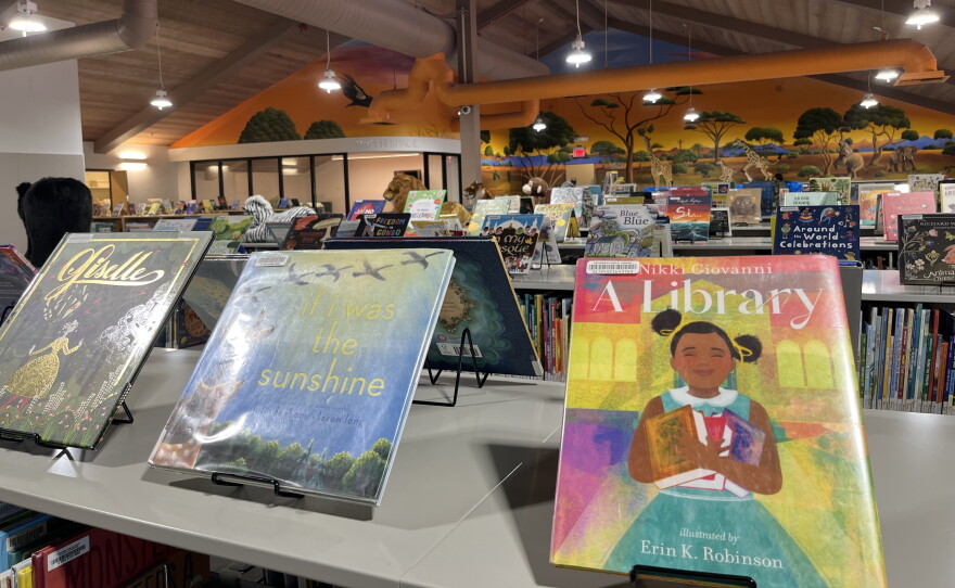 Books and stuffed animals sit atop shelves in the children's section on the Escondido Public Library's second floor on July 14, 2026.