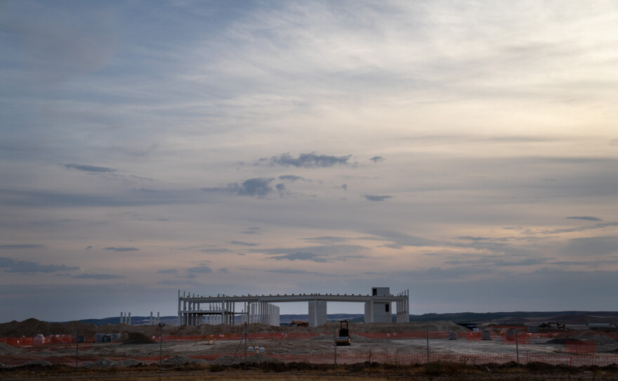 An Amazon data center, currently under construction, is seen in Villanueva de Gallego, Spain, on Sept. 27. Aragon authorities say they are betting that hosting data centers will place them at the center of a "new economy" they believe AI will bring. But many local residents and activist groups believe these projects are delivering an environmental crisis.