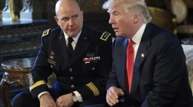 President Donald Trump speaks as Army Lt. Gen. H.R. McMaster listens at Mar-a-Lago in Palm Beach, Fla., in February 2017.
