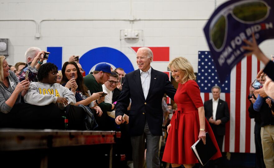 Biden and his wife, Jill, arrive at a town hall event in Des Moines, Iowa, on Feb. 2. Biden would finish a disappointing fourth in the Iowa caucuses.