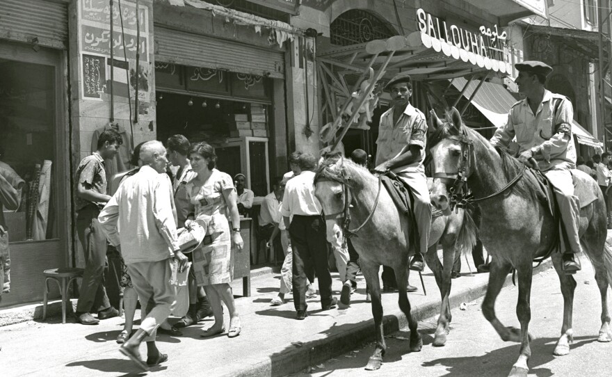 Palestinian mounted policemen patrol Gaza City's main street about two months after the 1967 Six-Day War.