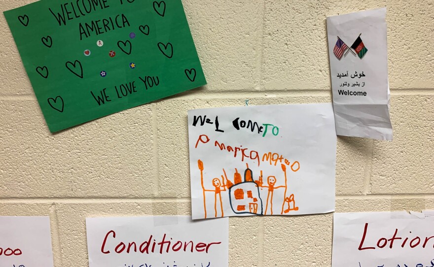 Handmade signs decorate the hallway at a refugee resettlement office in Fairfax County, Va.
