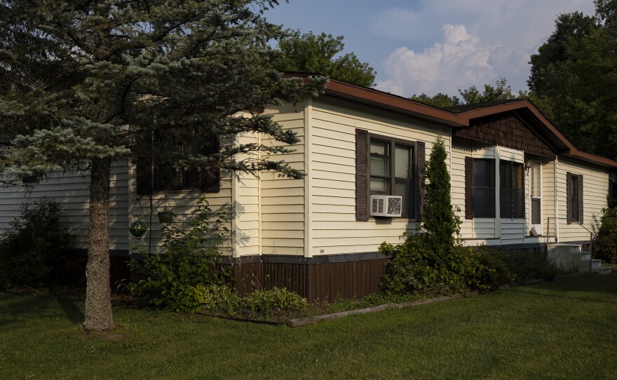 Mary Hunt's home in Swartz Creek, Mich., on Aug. 4. Havenpark Communities, her new landlord, started raising her rent and tacking on new fees. In the beginning of the year Hunt fell behind on rent, and was sued for eviction.