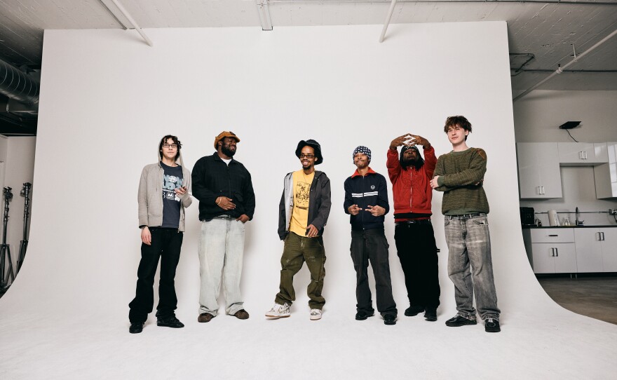 MIKE (second from left) and Earl Sweatshirt (third from left) with the members of Surf Gang, the New York-based collective who produced the rappers' new double album, Pompeii // Utility.