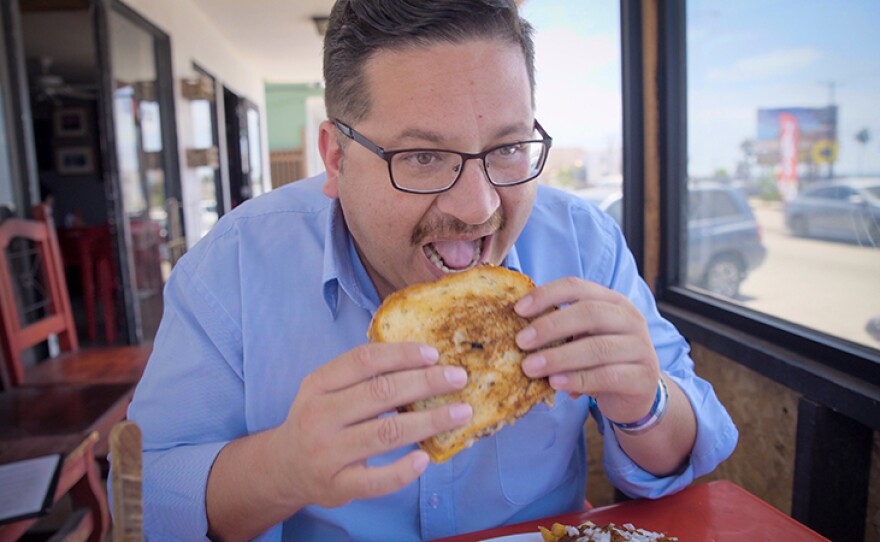 This is the moment that host Jorge Meraz first falls in love with the patty melt at Betty's Burgers in Rosarito, Baja Calif.