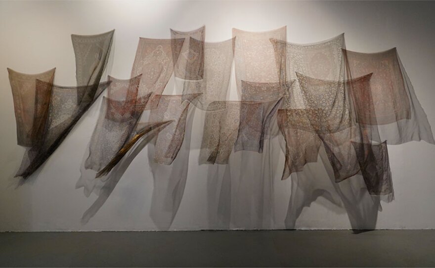 Artist Shirin Towfiq's "Thinking About Migration" work is shown in an undated photo. 