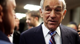 Republican presidential candidate Rep. Ron Paul speaks with voters after a town hall meeting in Keene, N.H., on Nov. 21. 
