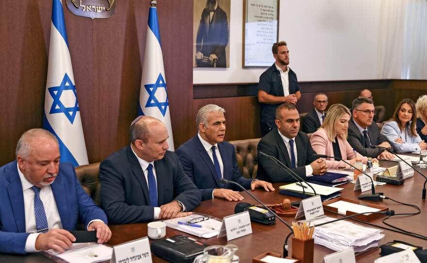 Israeli Prime Minister Yair Lapid, center, chairs a Cabinet meeting to approve the U.S.-brokered deal setting a maritime border between Israel and Lebanon, at in Jerusalem last Thursday.