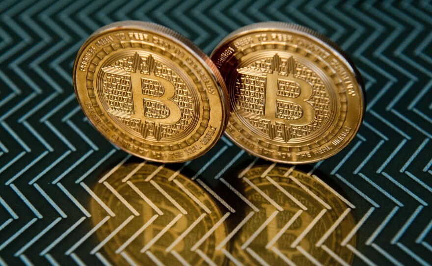Bitcoin medals represent the digital currency whose creator's identity has remained a mystery.