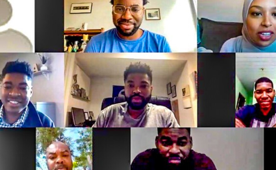 Honoré Prentice (top center, in glasses), who was adopted by a family in Canada, has a Zoom call with all five of his Haitian-born biological brothers during an interview with a reporter (upper right) for the CBC in Canada.