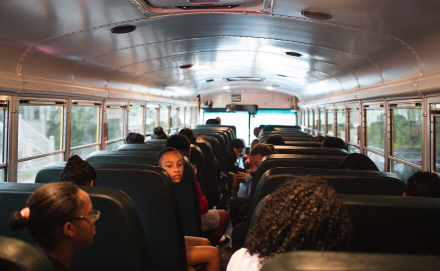 Students on the early-morning METCO bus ride to Newton, Mass.