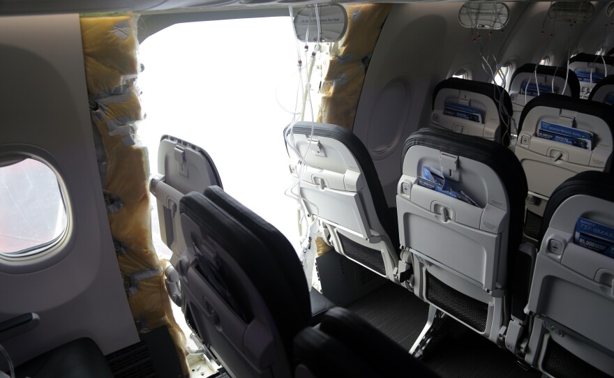 This National Transportation Safety Board photo shows an opening in the fuselage of Alaska Airlines Flight 1282. The door plug blew off the Boeing 737 Max 9 on January 5, 2024 as it climbed through 14,000 feet.