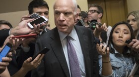 Sen. John McCain, R-Ariz., arrives at the Capitol for a weekly Republican policy meeting, in Washington, Tuesday, Sept. 26, 2017. 