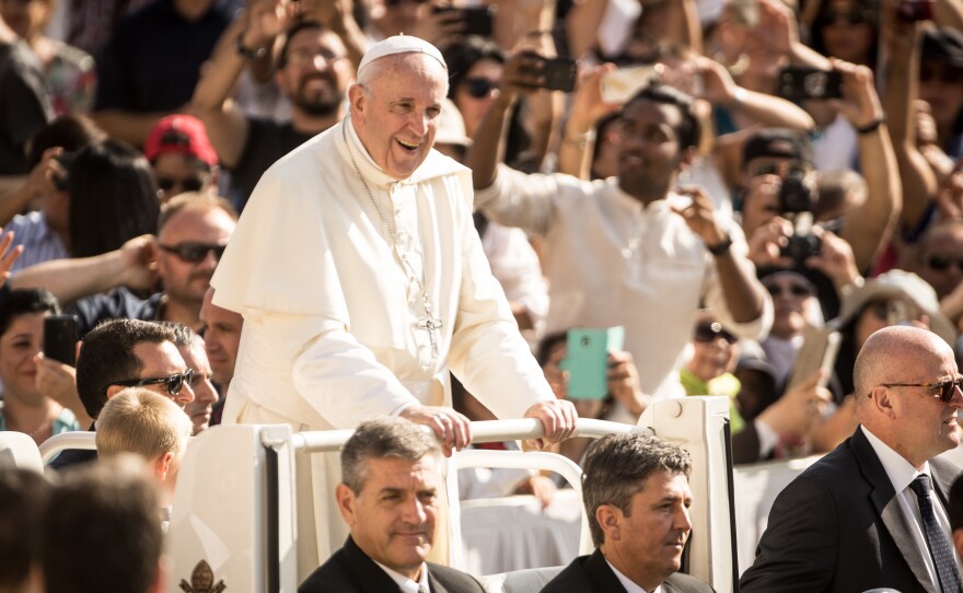 Pope Francis arrives for his weekly general audience in St. Peter's Square on Wednesday.