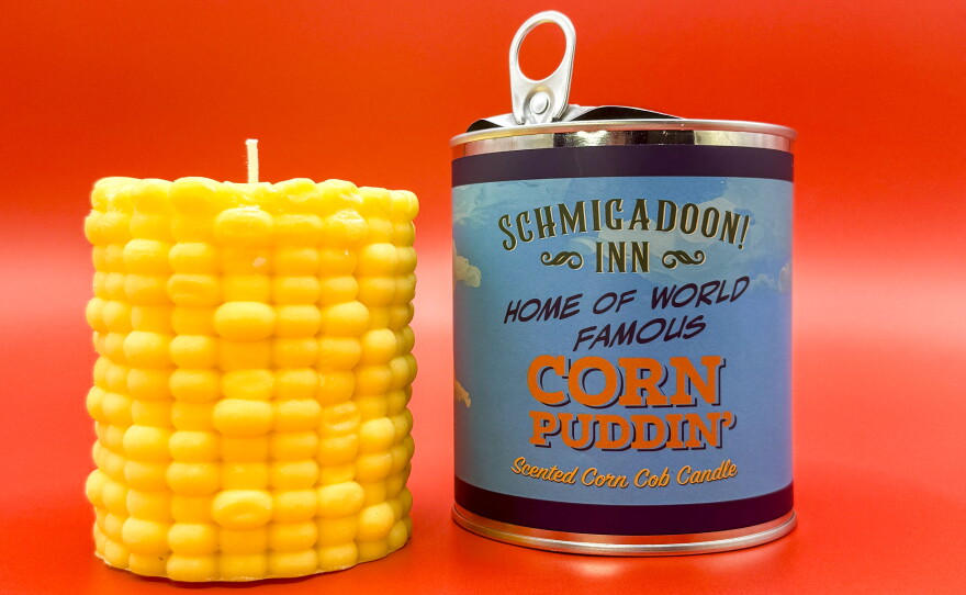 This "Corn Puddin'" candle is sold at Broadway's Schmigadoon!