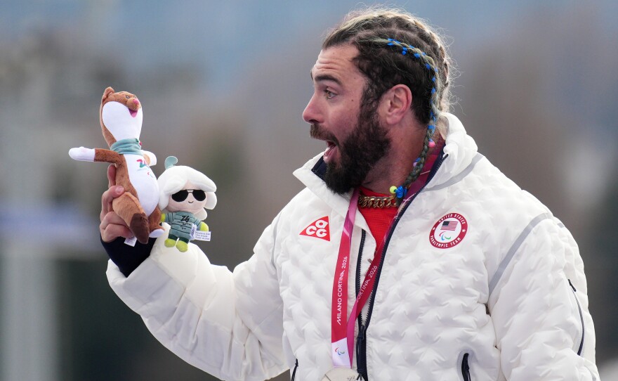 Patrick Halgren celebrates after winning a silver medal in the alpine skiing men's super-G standing on Monday.