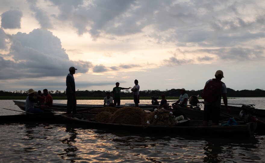 Riverside fishermen in their canoes on Nov. 15.