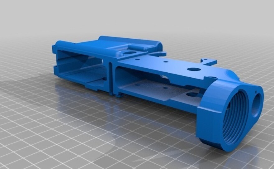 This is a computer-generated design for a vital part, called a lower receiver, of the AR-15 rifle. The design can be used to make the part on a 3-D printer.