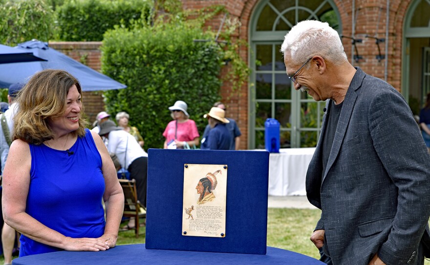 Eric Hanks (right) appraises a Charles Marion Russell mixed media, ca. 1915, in Woodside, Calif. ANTIQUES ROADSHOW “Filoli, Hour 1” premieres Monday, January 2 at 8/7C PM on PBS.