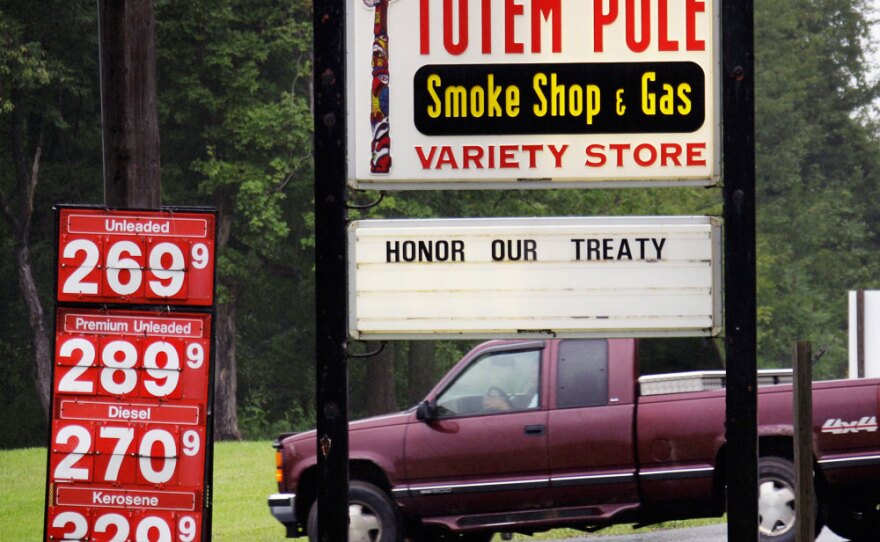 A motorist enters a business on the Tonawanda Seneca nation in New York. The state of New York is escalating its efforts to collect sales tax on cigarettes sold on tribal land.