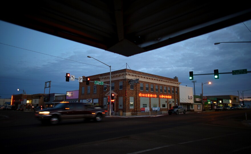 The "Cheerio Lounge" is one of the bars where the residents of Sidney can grab a drink on the town's main drag. Hotels are mostly still full, restaurants and bars are still busy, and hundreds of oil workers continue to move in every month, putting a strain on housing.