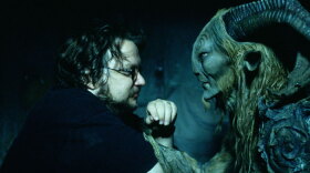 Director Guillermo del Toro with actor Doug Jones on the set of "Pan's Labyrinth" (2006).