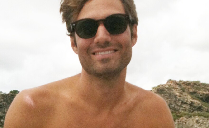 Nicholas Mevoli smiles while out diving in Curacao in October. He died a month later following an attempted dive in a freediving competition in the Bahamas.