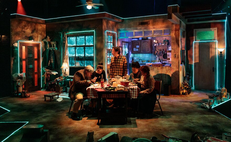 An undated production photo shows the cast of Cygnet Theatre's "Sharon," by playwright Keiko Green, set in a messy, crumbling apartment building where everything is not quite what it seems.