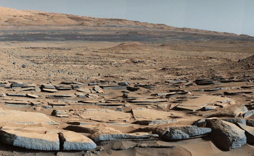 Rocks on the surface of Mars suggest that liquid water pooled on the surface and remained there for long periods.