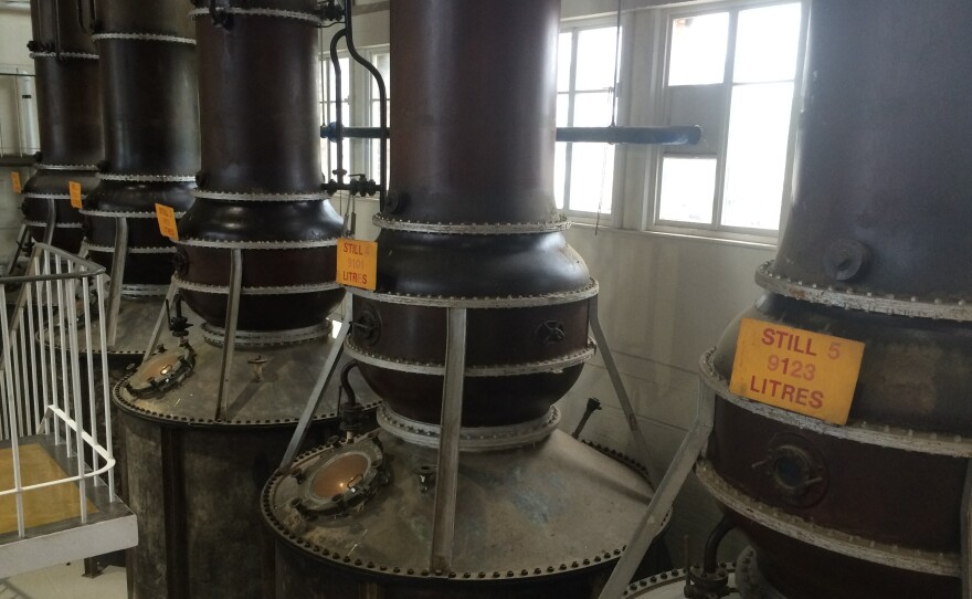 At Beefeater in London, large copper stills are used to distill the alcohol that will eventually become gin.